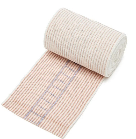 First aid compression bandage for sports injuries, suitable for first aid kits.